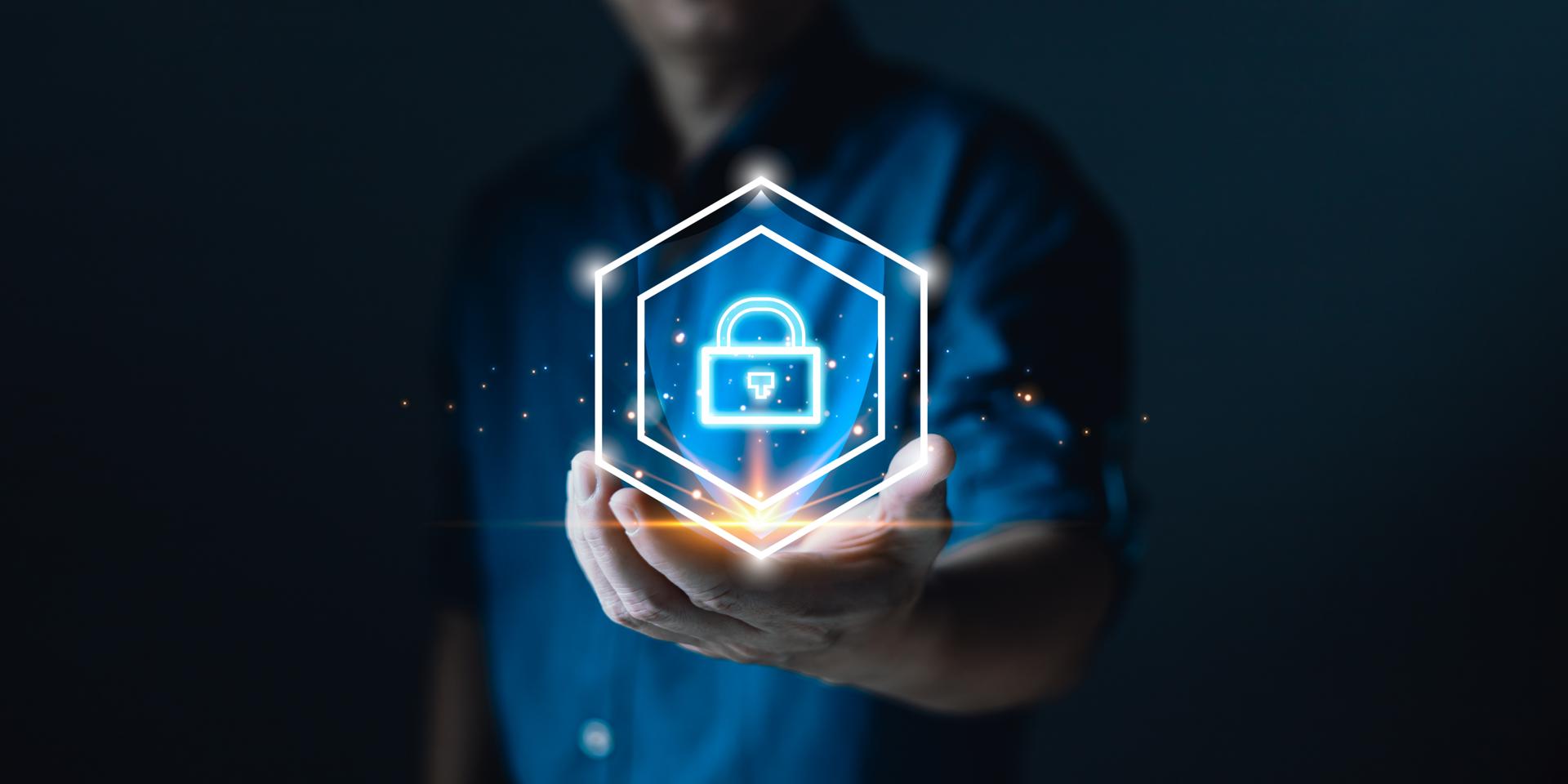 Businessmen protect personal data information from viruses on hand with virtual screen interfaces. Cyber security and privacy protection network security computer and safe data concept.