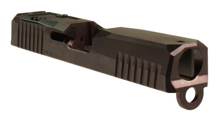 Black handgun slide viewed from the side, showing the barrel and slide features.