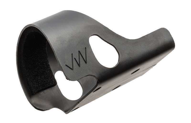 Black plastic accessory with cutouts, possibly a handle or grip attachment.