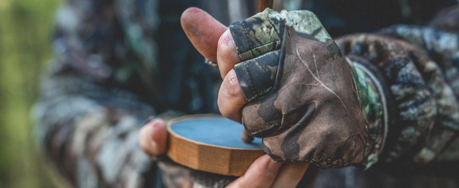 Man Operating a Turkey Call