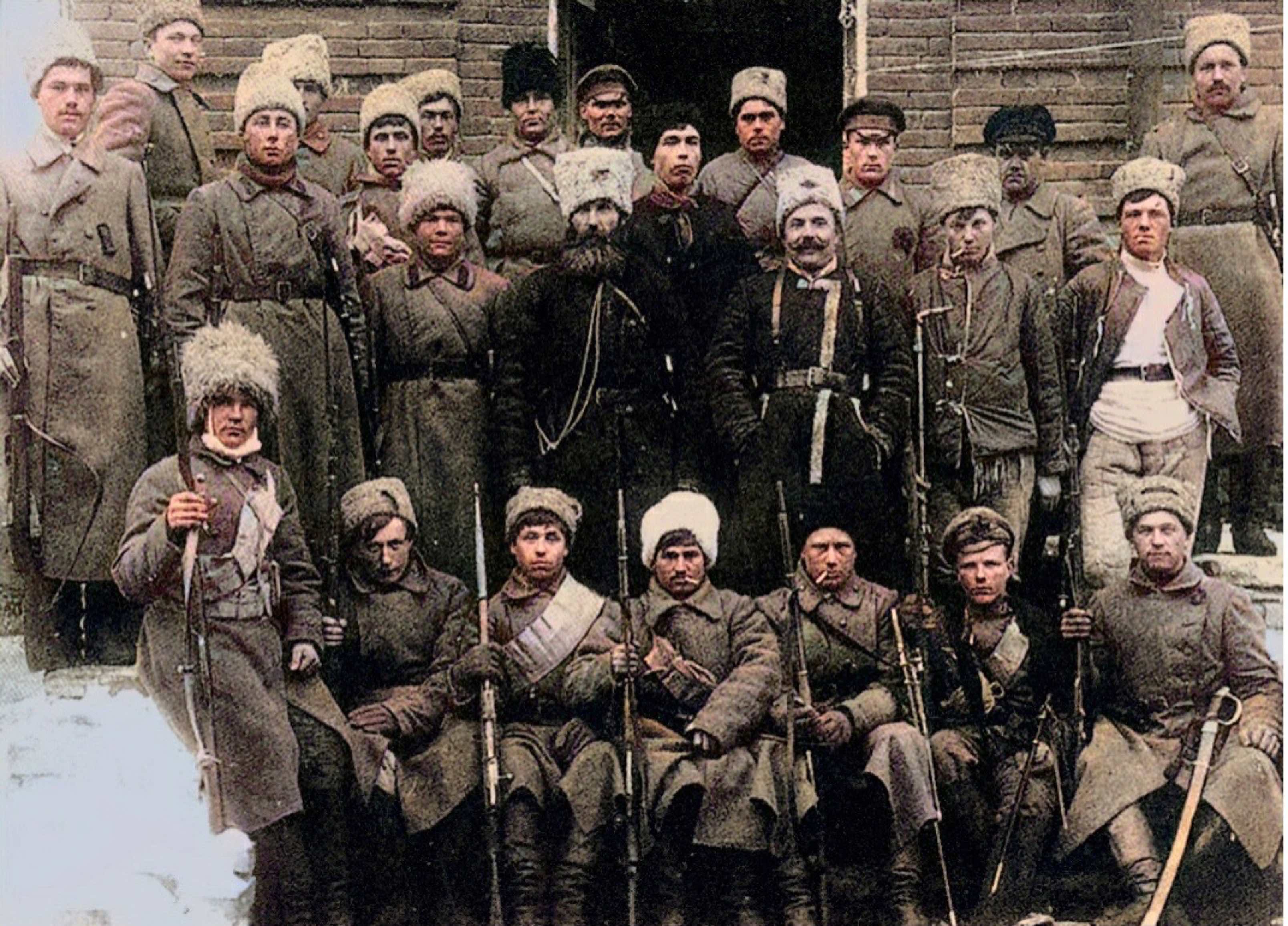 Historical group photo of soldiers in military attire.