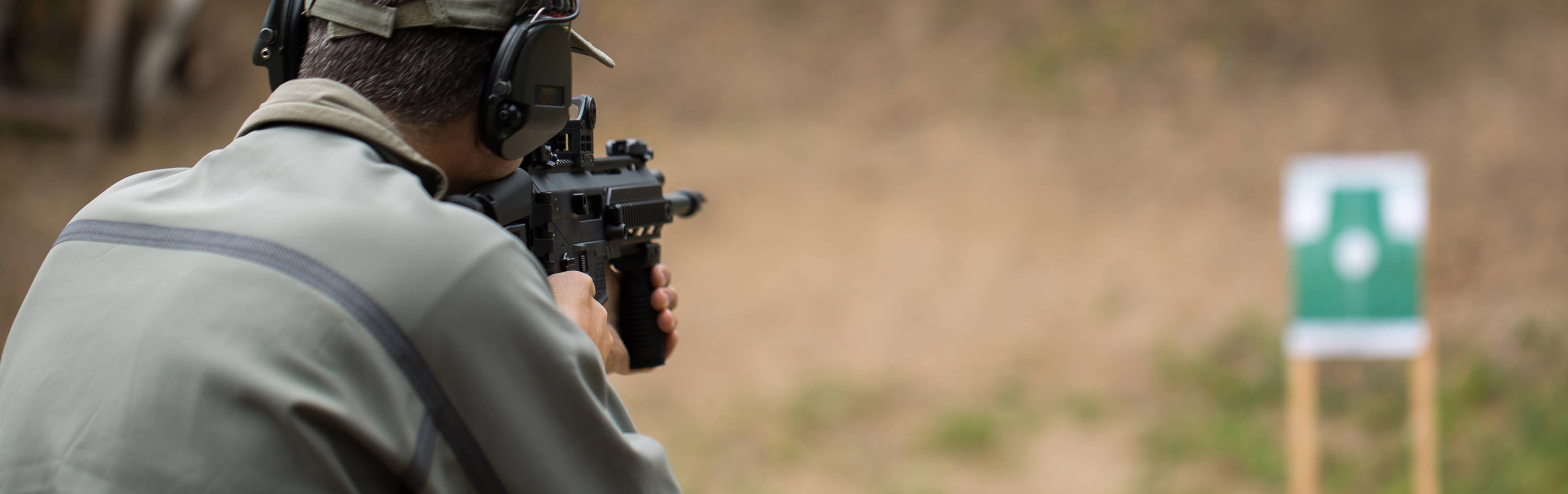 Man Shooting at Gun Range