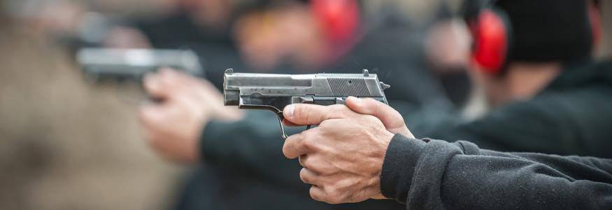 Men shooting at gun range