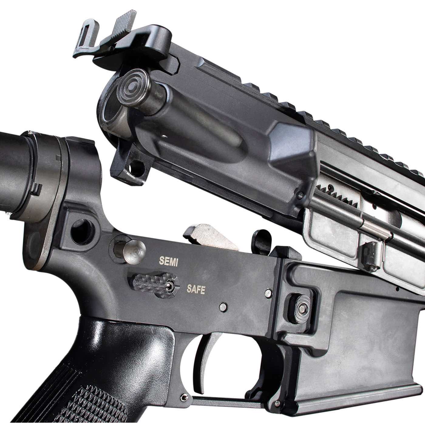 Close-up of a firearm, showing upper and lower receiver components.