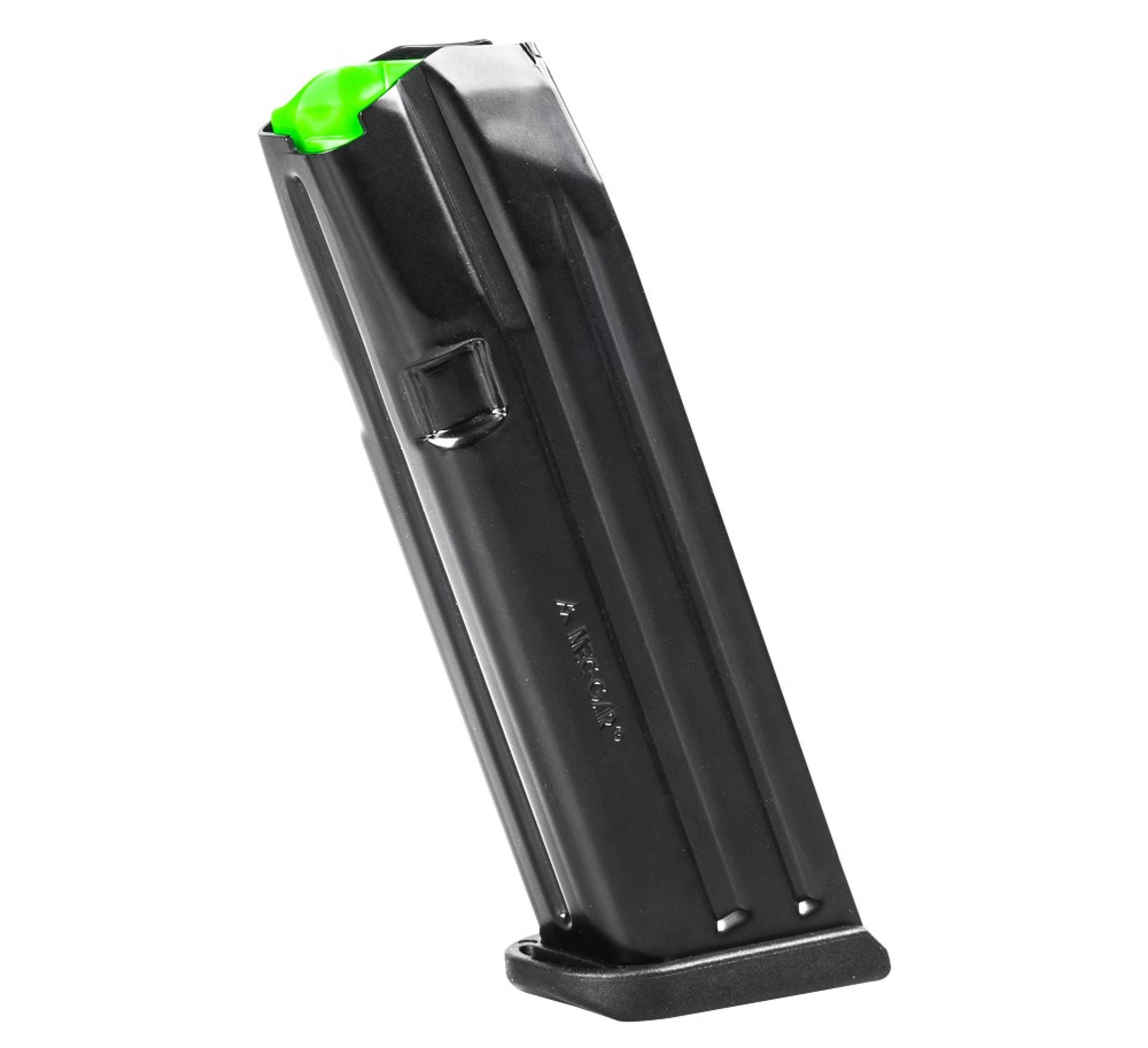 Black magazine with a green follower, standing upright.