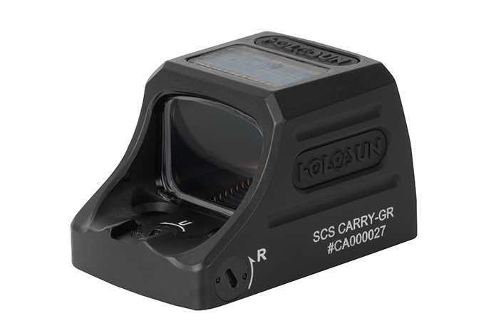 Black optical sight with display and mounting base.