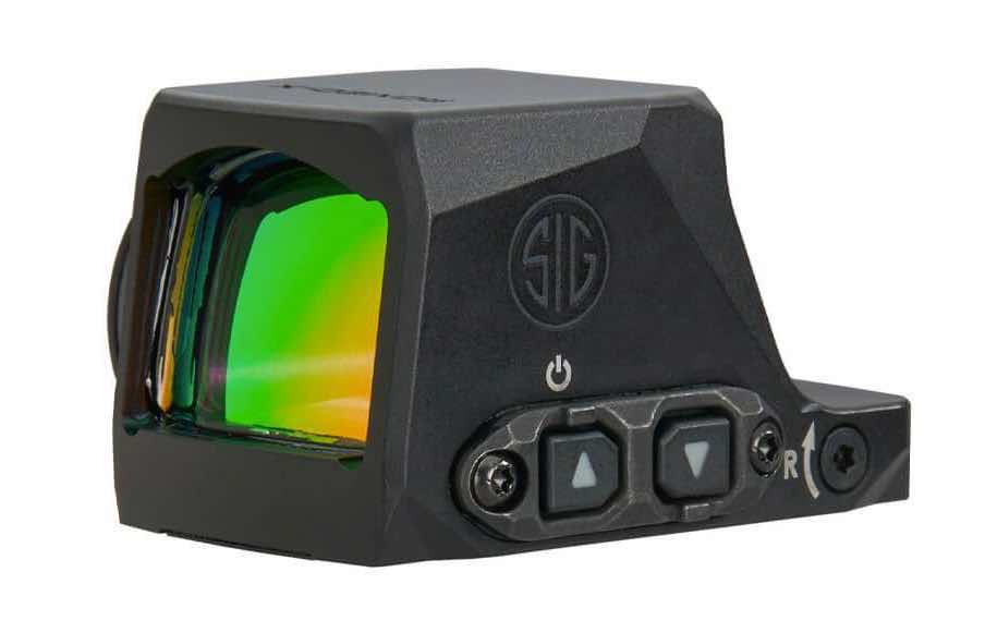 Black reflex sight with green lens and adjustment buttons.