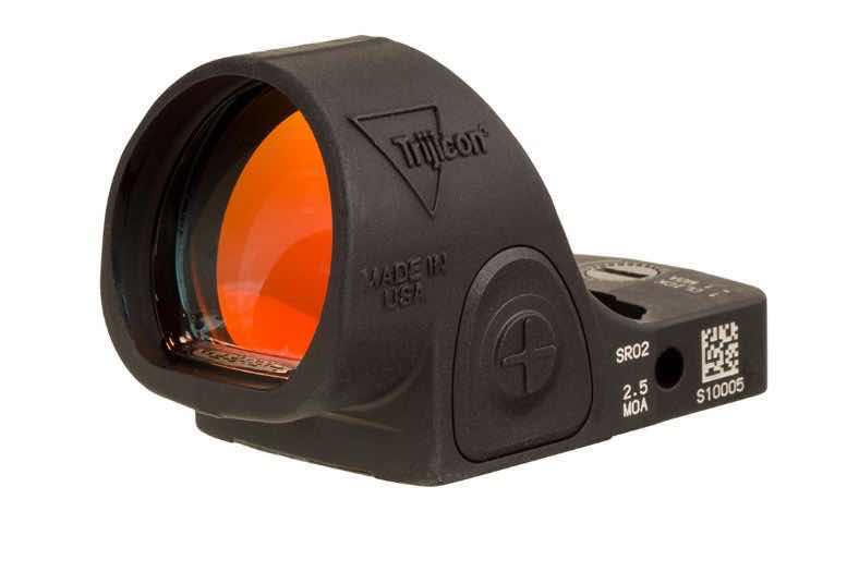 Black reflex sight with an orange lens.