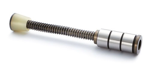 Metallic spring mechanism with a plastic end cap.
