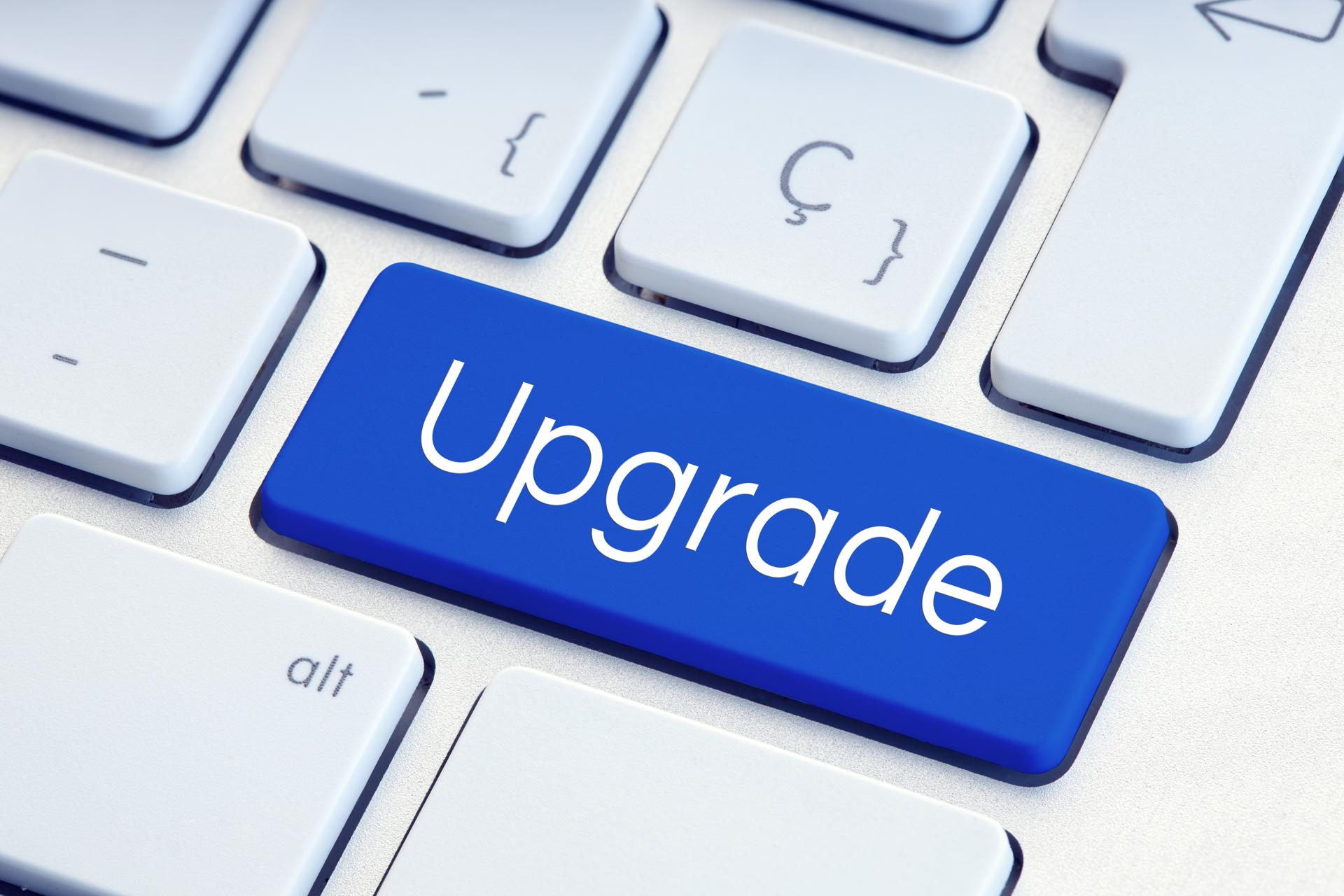 Upgrade Word on blue computer Keyboard Key