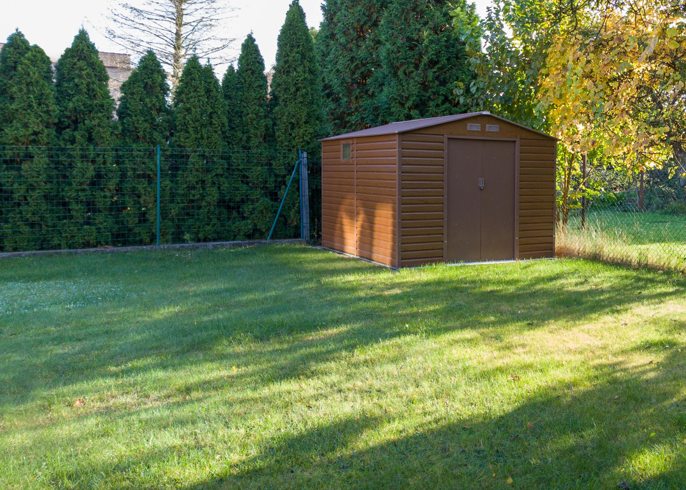 Garden shed in a sunny backyard
