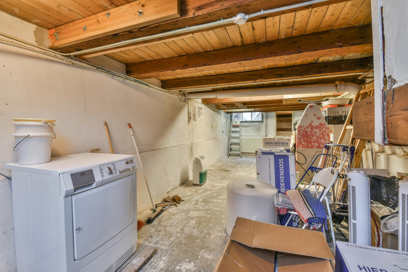 A laundry room with a washer and dryer