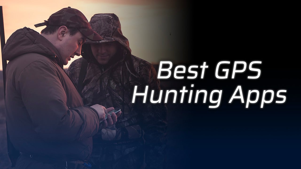 Two hunters discussing GPS apps at sunrise.