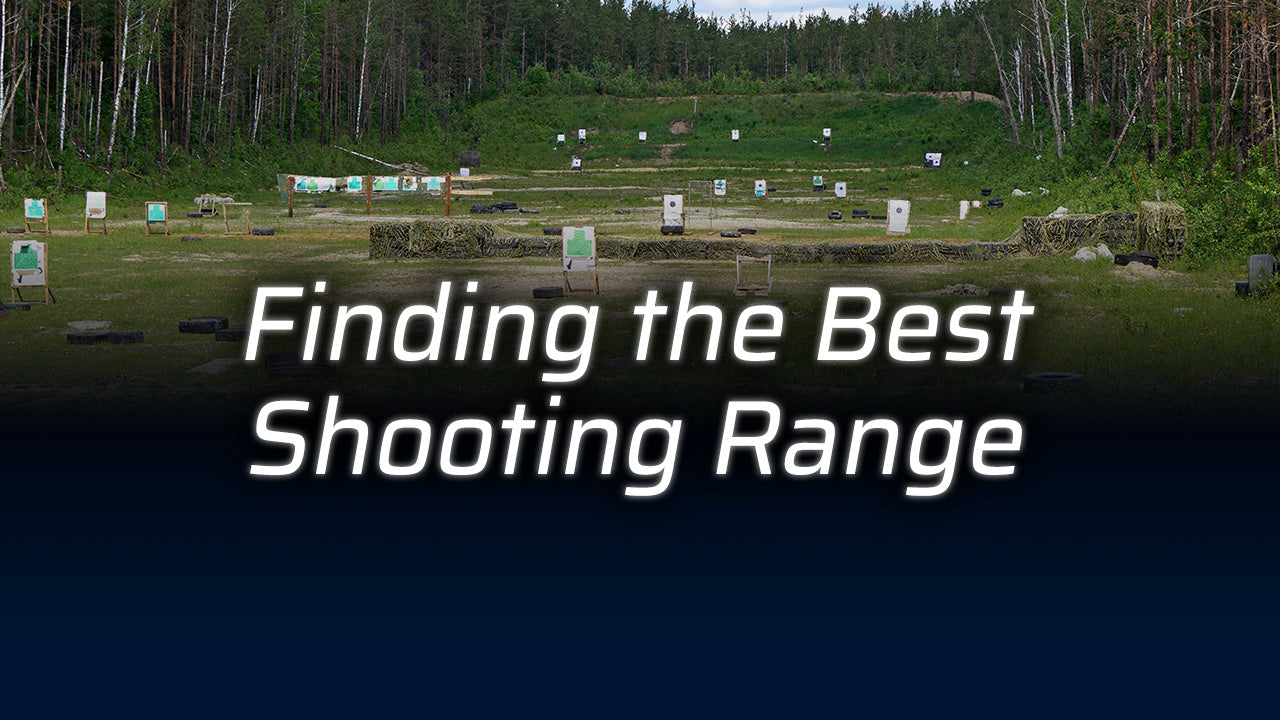 A shooting range surrounded by trees with targets visible.