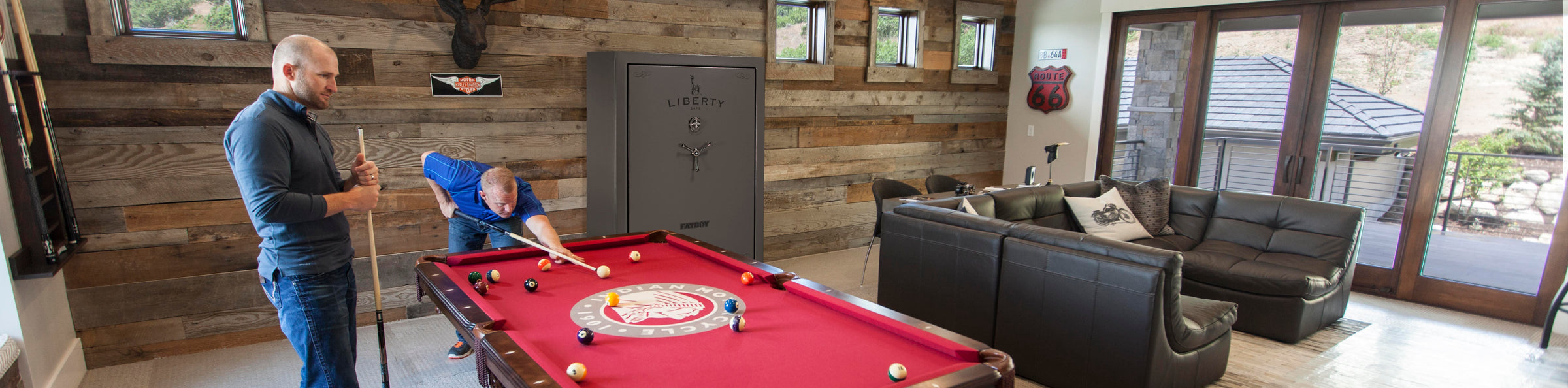 Shooting Pool with Gun Safe in Background