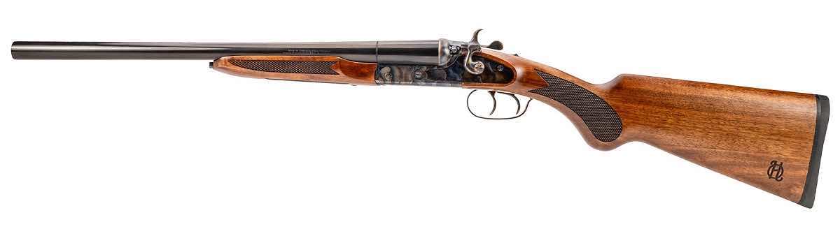 Double-barreled shotgun with a wooden stock and metal barrel.
