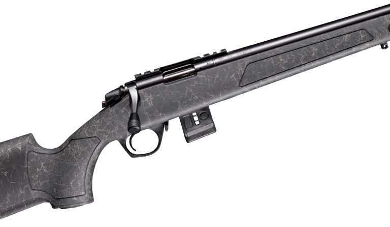 A black rifle with a textured stock and a long barrel.