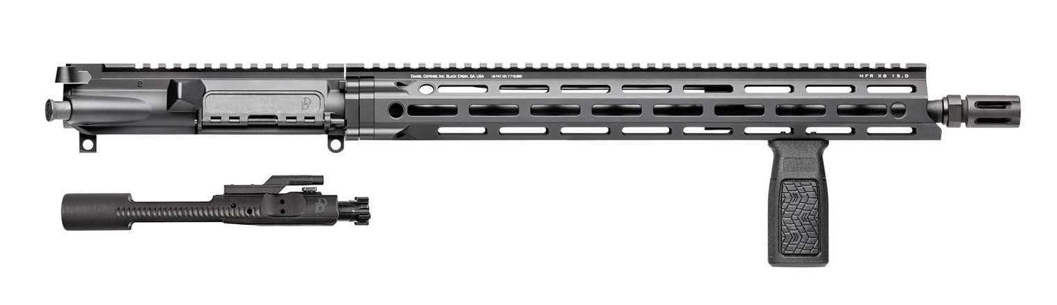 Black firearm with rail system and attached accessory.