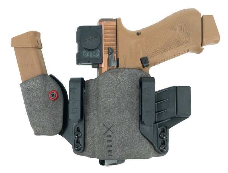 Handgun holster with magazine holder, featuring a tactical design.