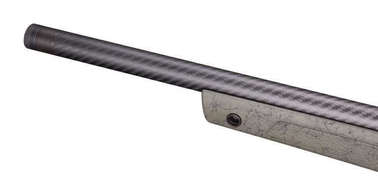 Close-up of a metallic rod with a textured surface and a small hole.