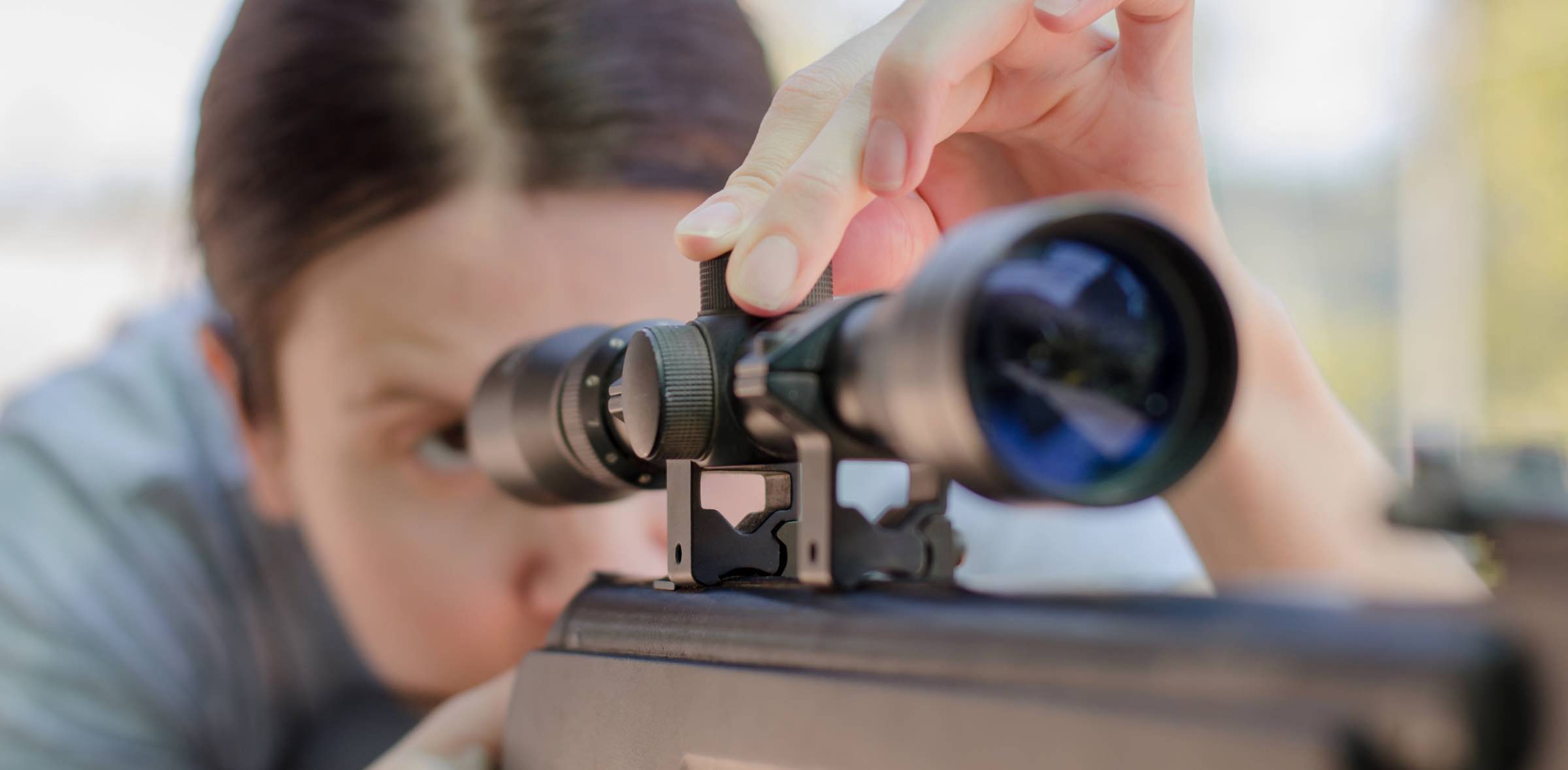 Woman Zeroing In Scope