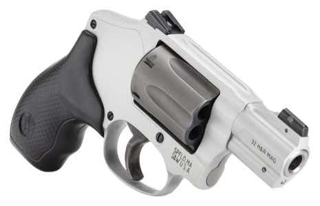 A silver and black revolver with a visible cylinder.